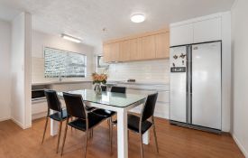 Three-Bedroom Unit - dining table and kitchen